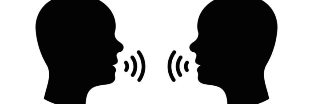 Two silhouetted human heads facing each other with sound waves between them, symbolizing communication or conversation.